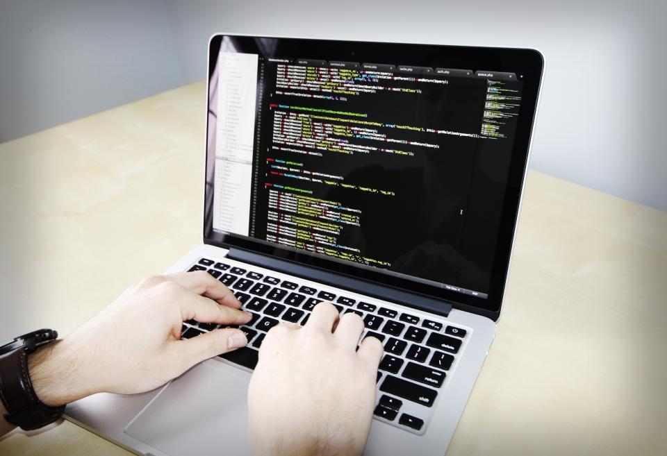 Laptop with code on screen